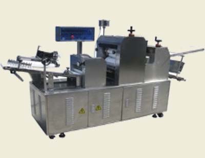 Dough forming machine  